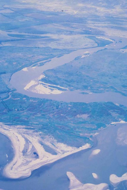 Figure 102 - The Catumbela River meanders and its mouth into the Atlantic Ocean (Angola).