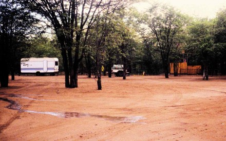 Figure 148 - Large mining group entrance to their camping site and chief geologist’s caravan (Caama region, Angola)